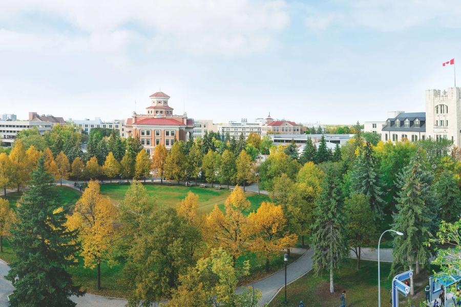 The Administration and Tier buildings shown with trees with Fall colours.