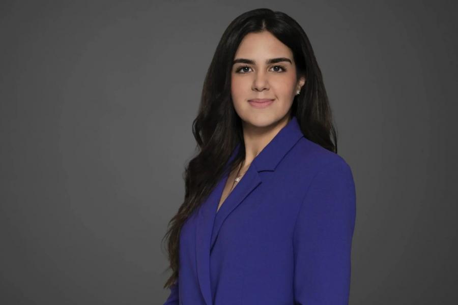 Dr. Mina Nouredanesh posing for a picture.