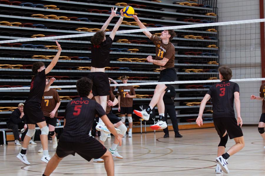 Action shot at the net at Central Showdown volleyball tournament in March 2026.