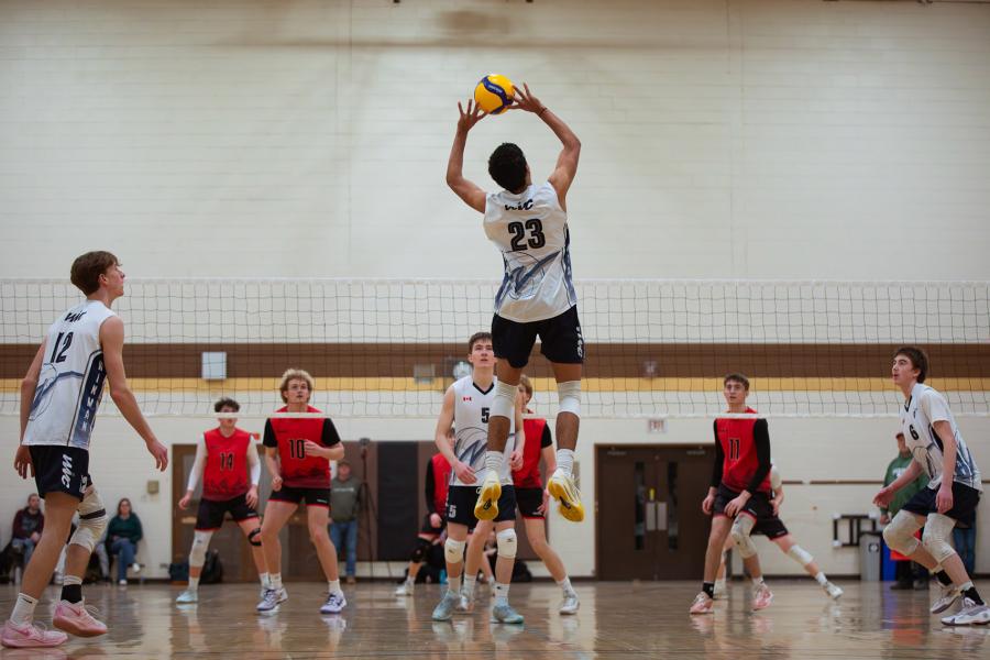 A player jump sets the ball at Central Showdown volleyball tournament in March 2026.