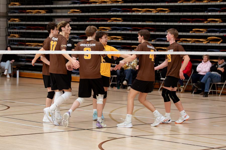 Players celebrate as a team after a play at Central Showdown volleyball tournament in March 2026.