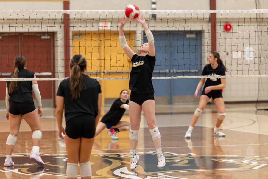 A Junior Bisons girls volleyball team practices in the 2026 season.