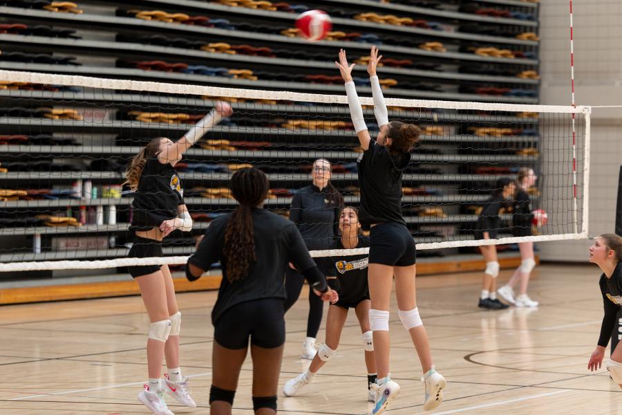 A Junior Bisons girls volleyball team practices in the 2026 season.