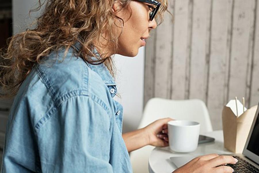 Woman on computer at her desk