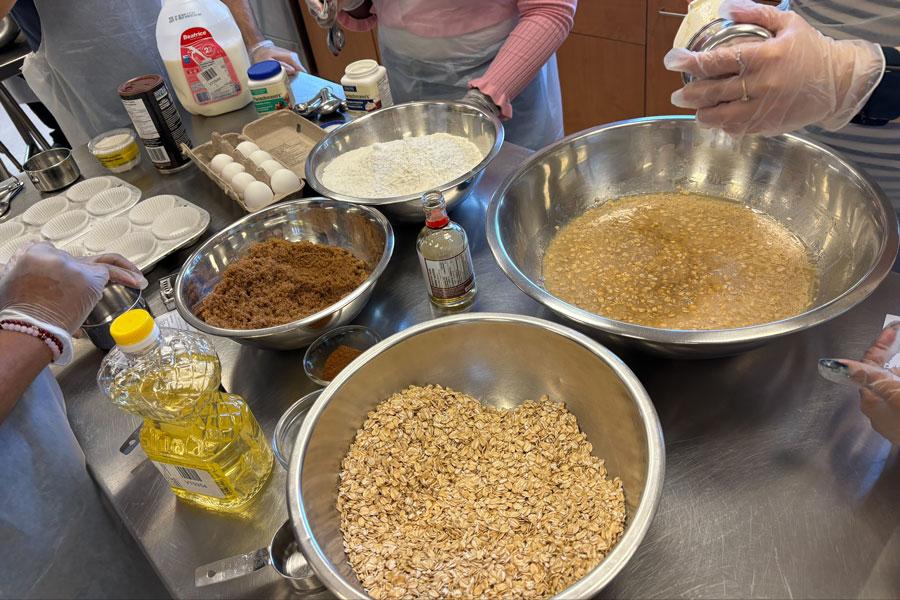 Ingredients for maple brown sugar oatmeal muffins in various bowls