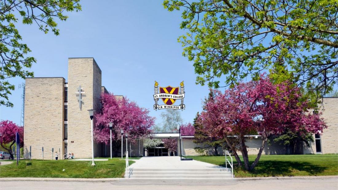 Front of St. Andrew's College in Winnipeg with St. Andrew's College Crest in the middle.