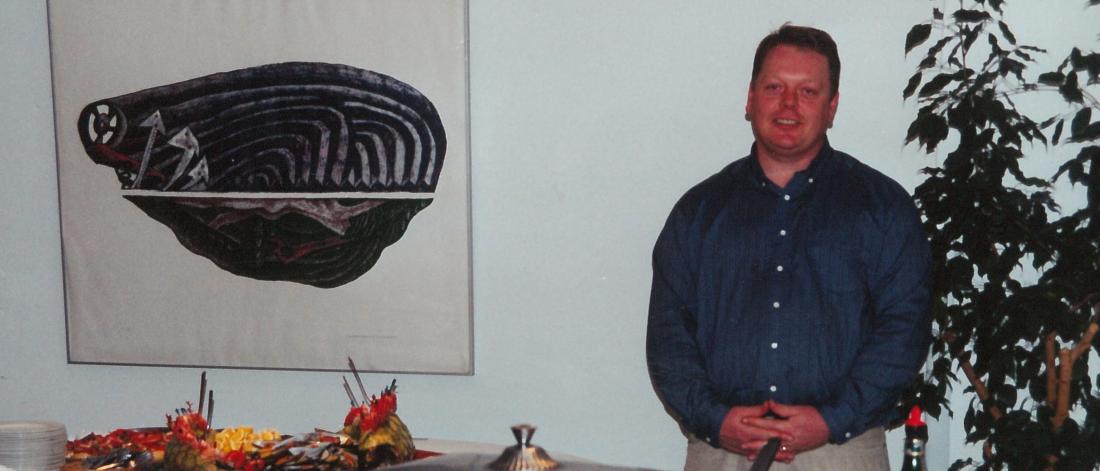 Ian Park standing in front of food catering