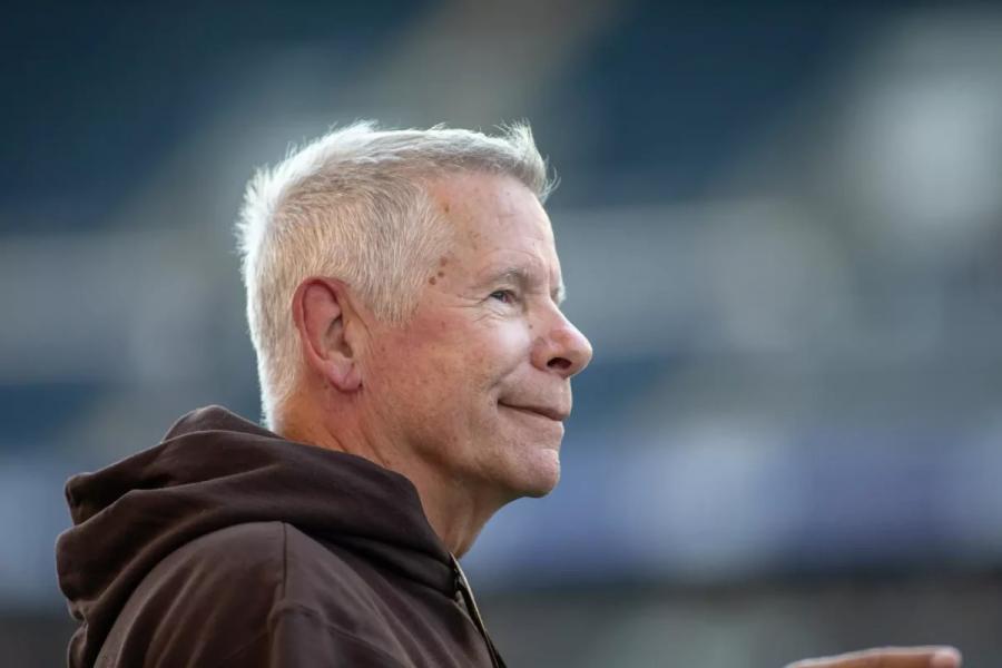Brian Dobie's side profile as he smiles