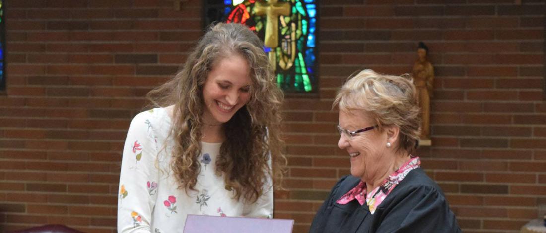 A St. Paul's College Foundation award being presented