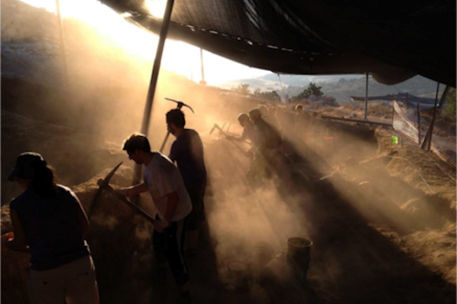 Students at an archaeological dig site