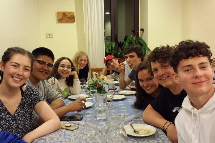 student group eating dinner at assisi hotel la rocca in Italy