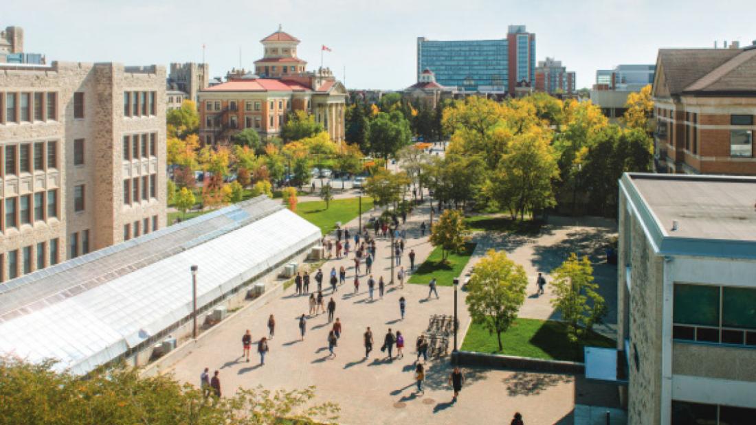 An overhead photograph of the Fort Garry University of Manitoba campus bustling with people.