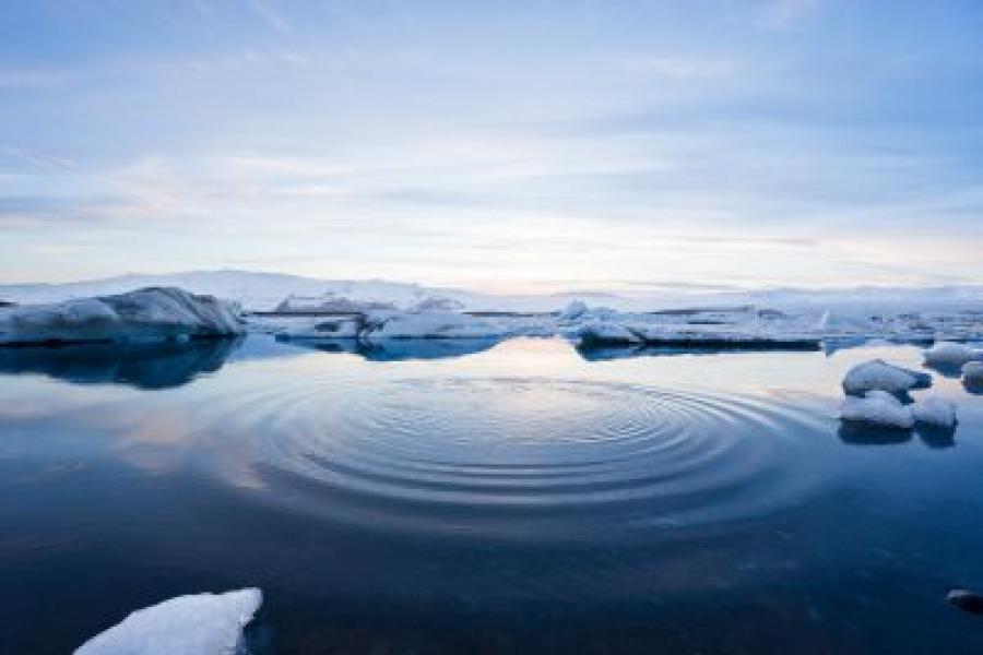 Arctic sea ice melting with water in front